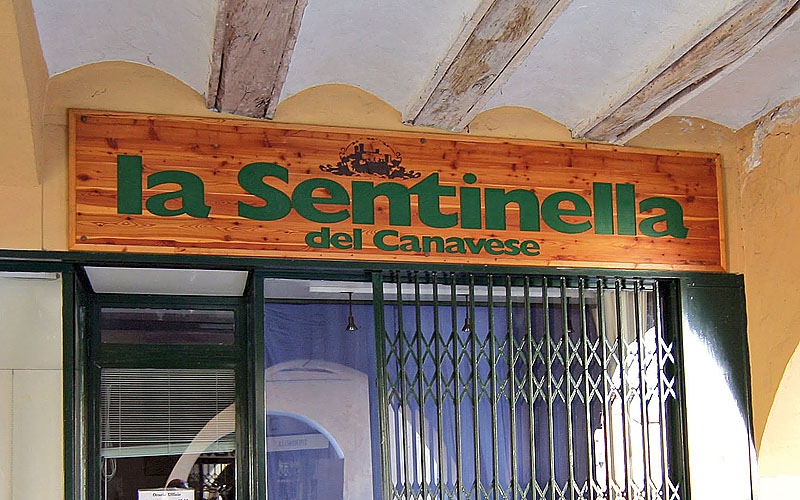 Insegna in legno